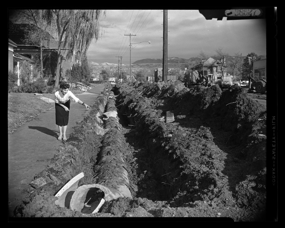 Large open trench along 700 East during construction in 1956