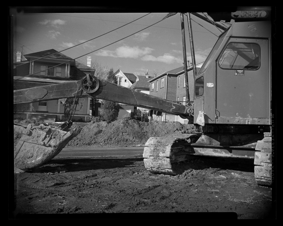 Excavator working along 700 East during construction in 1956