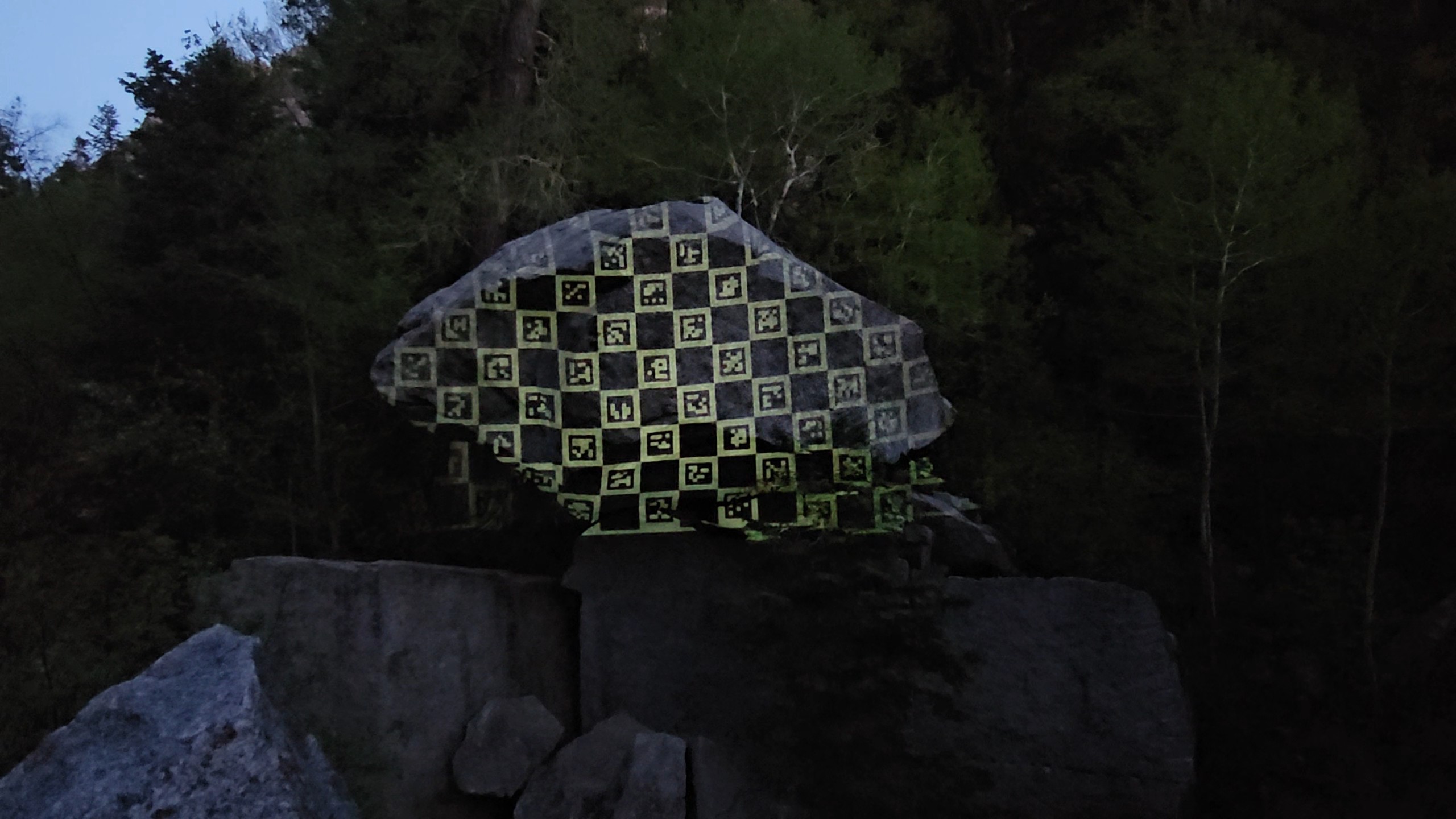 Hidden Layer projection mapping on a rock formation